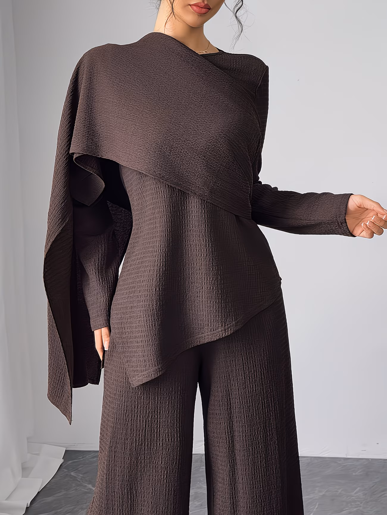 Tunic top paired with wide-leg pants