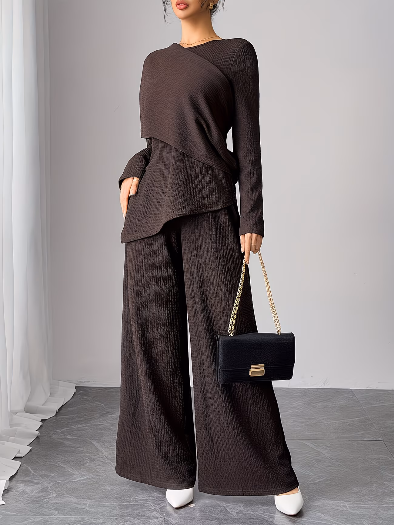 Tunic top paired with wide-leg pants
