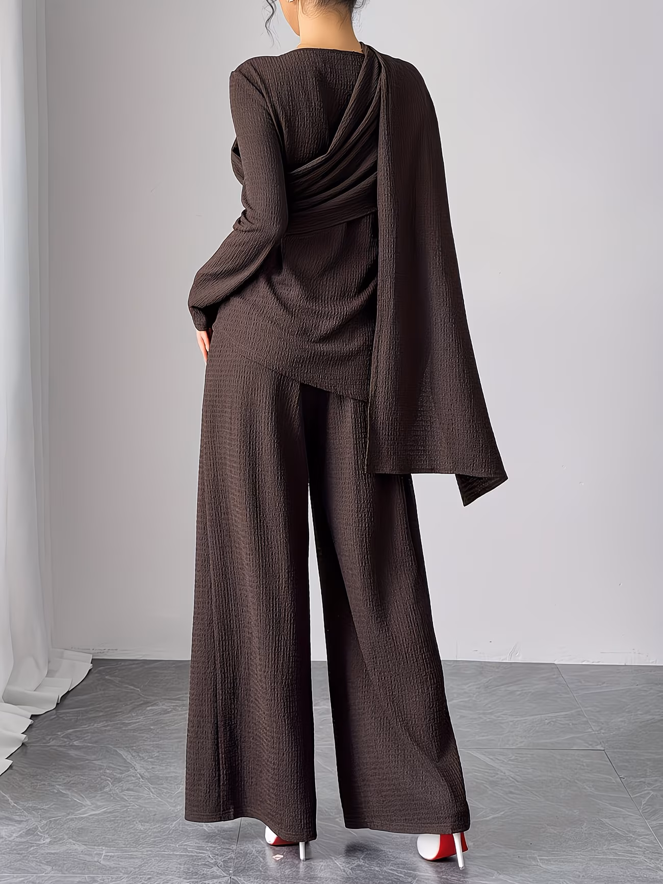Tunic top paired with wide-leg pants